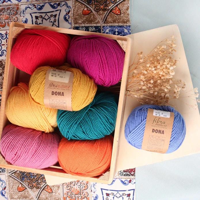 Fibra Natura Dona – 100% Extra Fine Merino Wool Yarn Perfect for Soft and Durable Creations. Each 50g skein offers 115 meters (125yards).